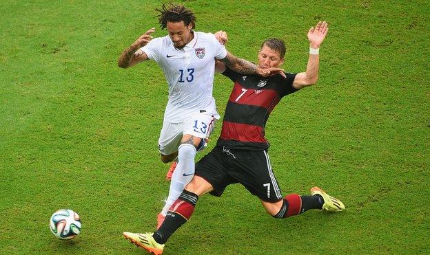 Jermaine Jones of the United States is challenged by Bastian Schweinsteiger of Germany during the 2014 FIFA World Cup