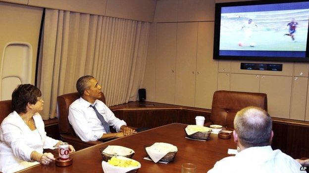 President Barack Obama watches the match from Air Force One