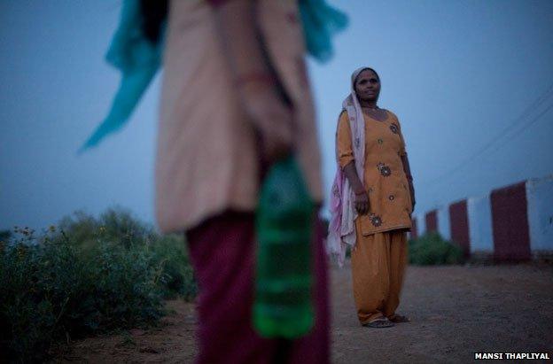 Kailash and daughter with water bottle