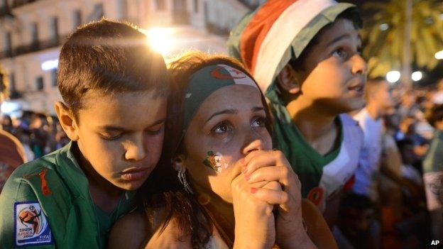 Algerian football fans watch the Algeria-Russia game at the World Cup in Algiers - 26 June 2014