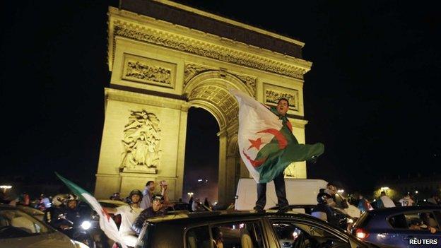 Algerian football fans celebrate in Paris, France - 26 June 2014