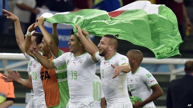 Algerian players celebrate after the group H World Cup football match between Algeria and Russia at the Arena da Baixada in Curitiba, Brazil - Thursday 26 June 2014