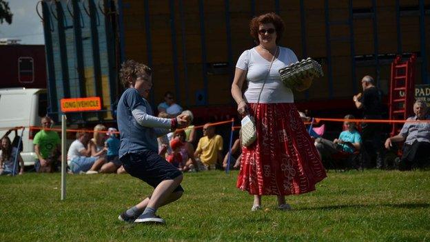 Young competitor in the Egg Throwing Championships in Swaton