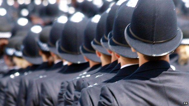 Police graduates at a passing out ceremony