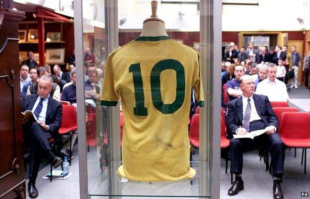 A shirt worn by Pele being auctioned at Christies in 2002