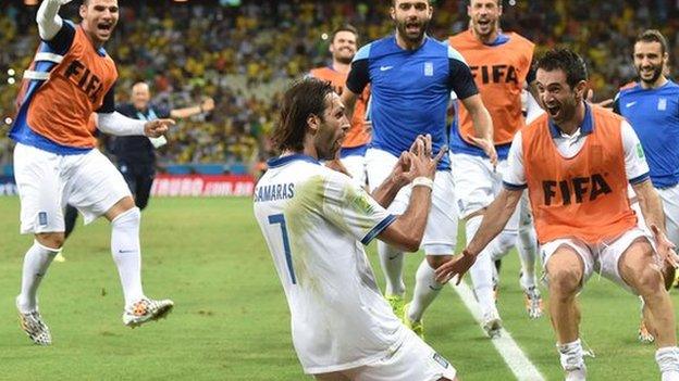 Georgios Samaras scores from the penalty spot to secure a 2-1 victory over Ivory Coast