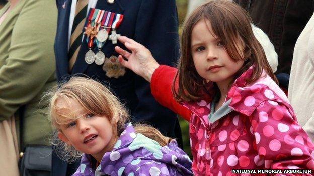 Children watch the parade