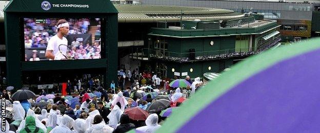 Spectators on the hill