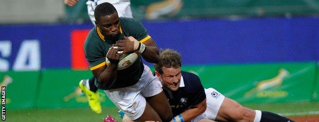 South Africa's Lwazi Mvovo crosses the line for his first try of the match