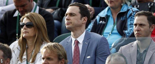 Big Bang Theory actor Jim Parsons (centre) watches Eugenie Bouchard