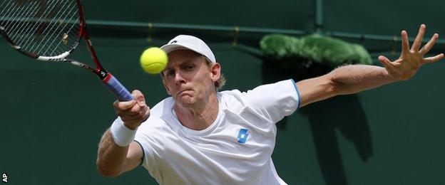 Kevin Anderson in action at Wimbledon 2014