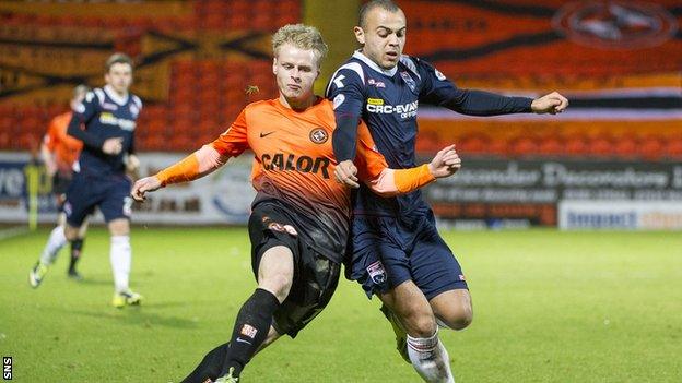 Ben Gordon battled with Gary Mackay-Steven of Dundee United (left)