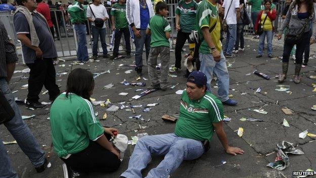 Desolate Mexican fan at the Zocalo square in Mexico City