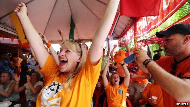 Dutch supporters celebrate victory in Surinam