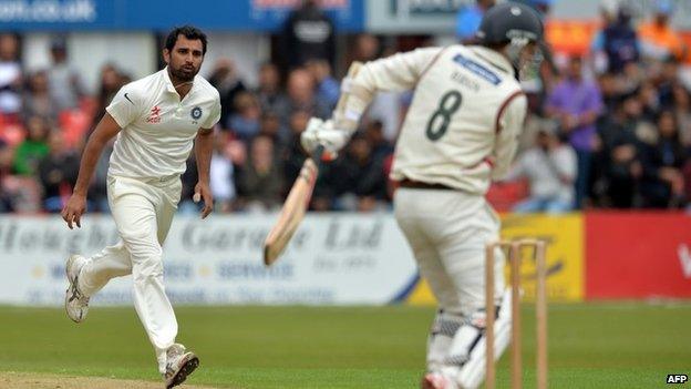 India's Mohammed Shami bowls on the third day of the cricket Tour Match between Leicestershire and India at Grace Road in Leicester, central England on June 28, 2014