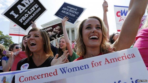 Anti-abortion demonstrators cheered as the ruling was announced outside the US Supreme Court in Washington DC on 30 June 2014