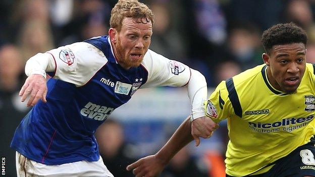 Paul Green (left) playing against Birmingham