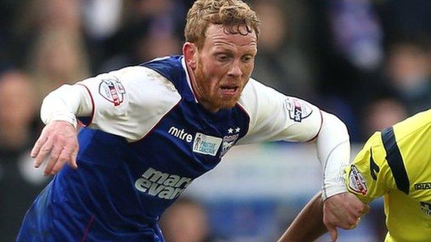 Paul Green (left) playing against Birmingham