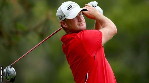 Golfer Jamie Donaldson plays a shot.