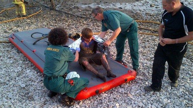Boy saved from quicksand