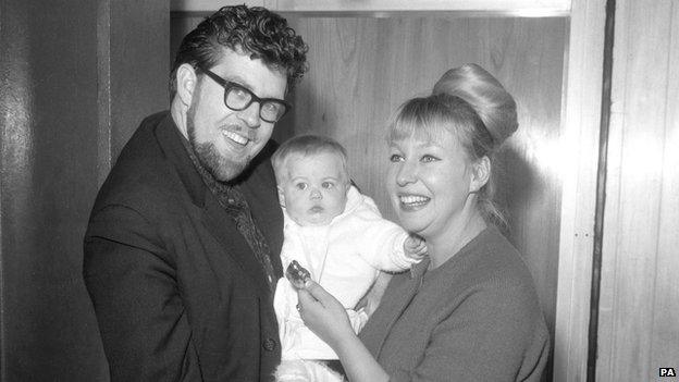 Harris with his wife and daughter