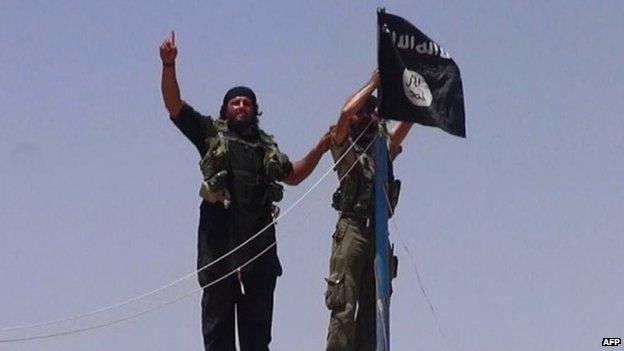 Isis fighters near Iraq-Syria border (file photo)