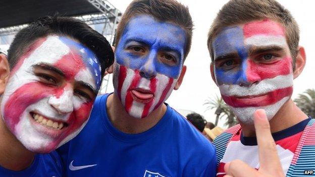 US fans show their support with faces painted while gathered to watch on a big screen at Hermosa Beach, California on 26 June, 2014