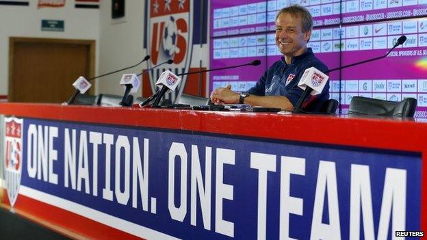 Juergen Klinsmann listens to a question during a news conference at the team's training centre in Sao Paulo on 27 June, 2014