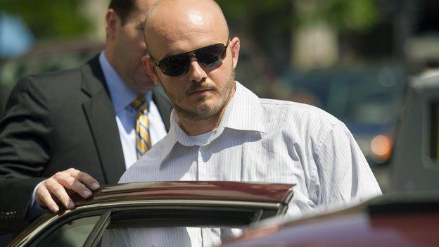 Former Blackwater Worldwide employee Nicholas Slatten gets out of a car outside a Washington, DC courthouse