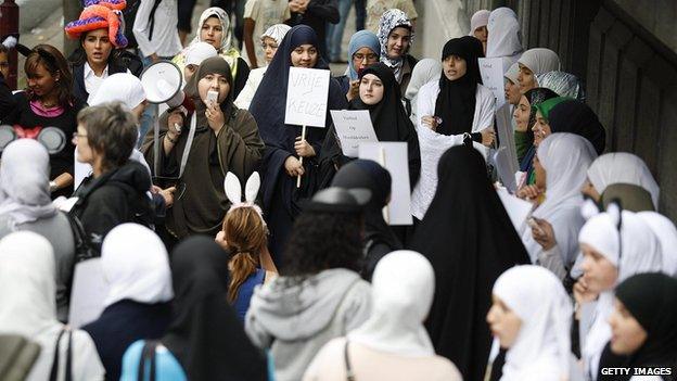 Veiled women protest against the ban of the headscarf, worn by Muslim girls, at schools on the first day of the new school year in Antwerp on 1 September 2009.