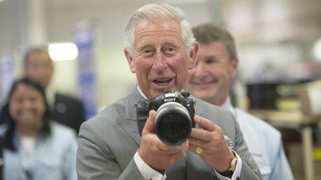 Prince Charles with a camera