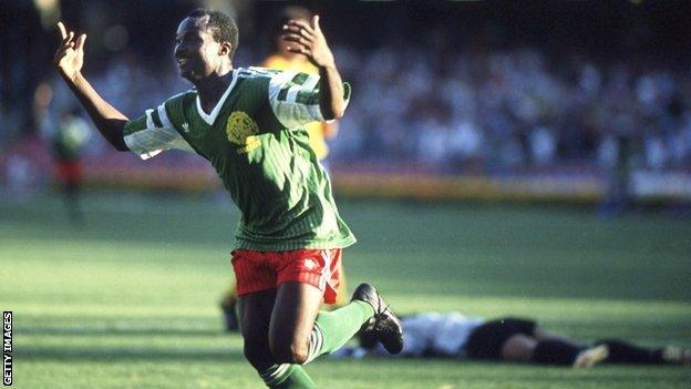 Cameroon's Roger Milla celebrates scoring against Colombia in 1990