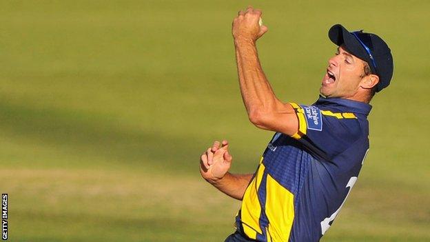 Dean Cosker celebrates a wicket for Glamorgan