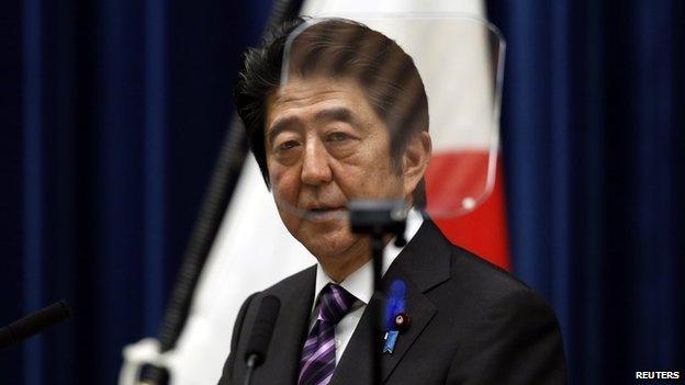 Japan's Prime Minister Shinzo Abe attends a news conference at his official residence in Tokyo on 1 July, 2014