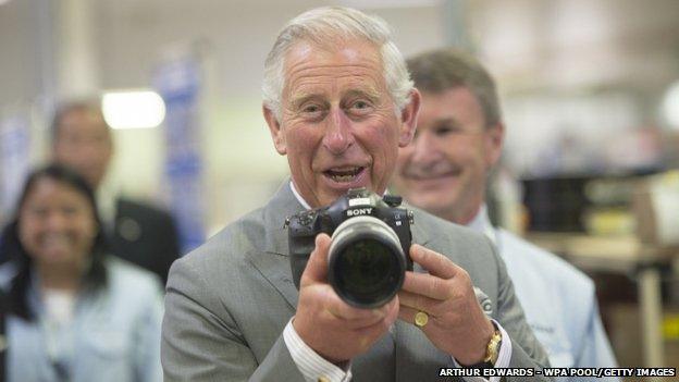 Prince Charles with a camera