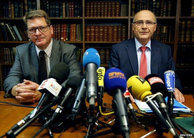 Marseille's state prosecutor Brice Robin (R) and inter-regional head of judicial police Christian Sainte (L) attend a news conference in Marseille - 24 June 2014