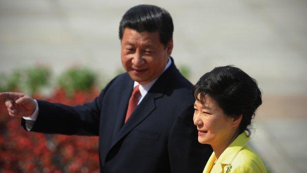 South Korean President Park Geun-Hye and Chinese President Xi Jinping inspect Chinese honour guards during a welcoming ceremony outside the Great Hall of the People on 27 June, 2013 in Beijing, China