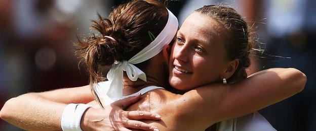 Lucie Safarova embraces Petra Kvitova