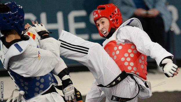 Jade Jones kicks her opponent