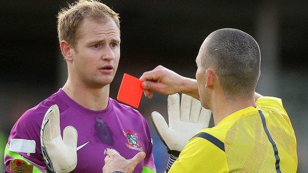 Aberystwyth Town goalkeeper Mike Lewis is sent off
