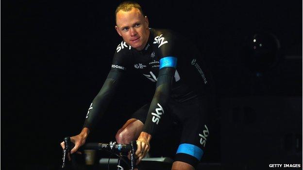 Defending Champion Chris Froome of Great Britain and Team SKY rides onto the stage during the 2014 Tour de France Team Presentation prior to the 2014 Le Tour de France Grand Depart on July 3, 2014 in Leeds, United Kingdom. (Photo by Bryn Lennon/Getty Images)