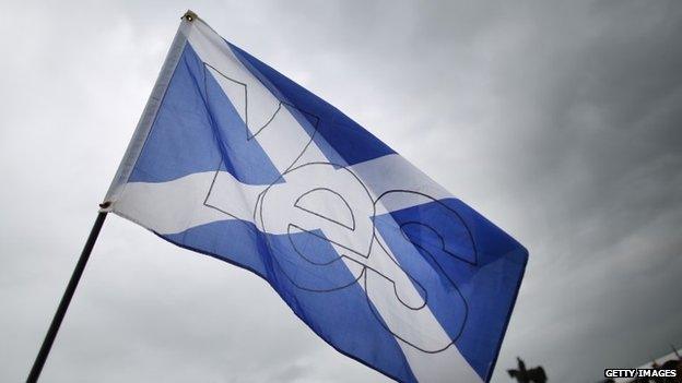 Scottish Saltire flag caries a "Yes" for Independence at the Bannockburn Live event