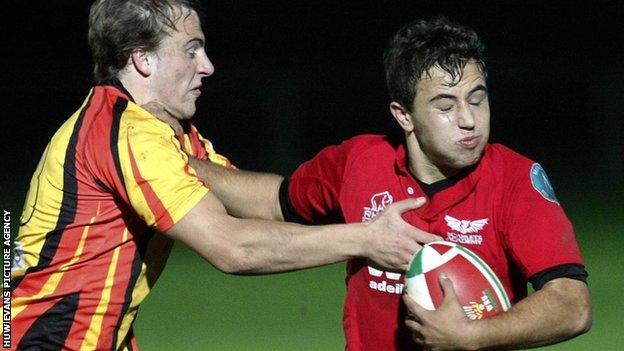 Luke Treharne in action for Scarlets under-18