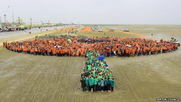 Human poppy on Southport Beach