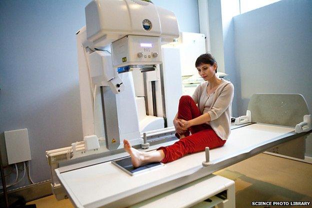 A woman having an ankle X-ray