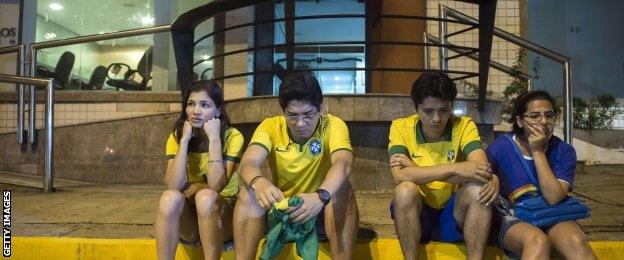 Fans gather outside the Sao Carlos hospital in Fortaleza