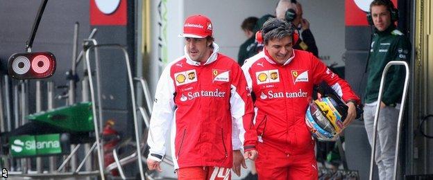 Fernando Alonso (left)