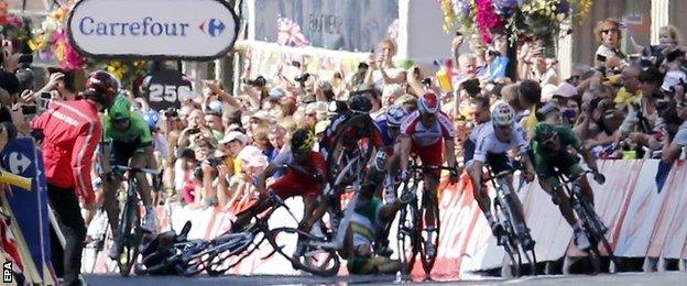 The crash involving Mark Cavendish (left) and Simon Gerrans (centre)