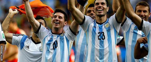 Argentina players celebrate defeating Belgium 1-0 in the World Cup quarter-finals