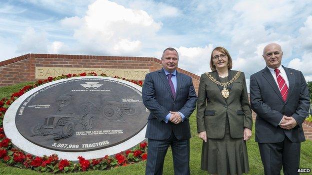 Andy Peters, Hazel Noonan and Richard Markwell (left to right) with the artwork